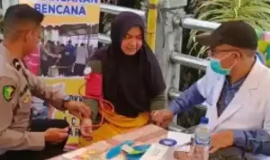 polri-beri-pelayanan-kesehatan-gratis-untuk-korban-banjir-di-aceh-1764668296844_169